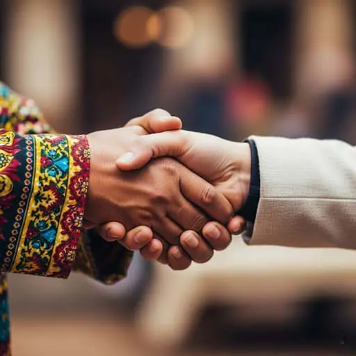 Cái bắt tay tôn trọng thể hiện lời chào truyền thống và sự tôn trọng giữa các nền văn hóa